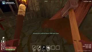 The player holds a short-handled Hammer with a broad head